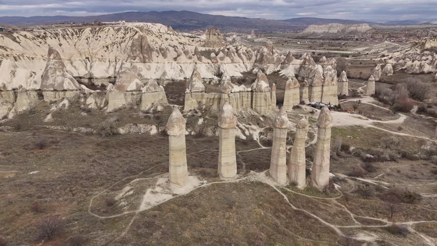 Cappadocia Wonders Love Valley surreal rock formations in Cappadocia Turkey beauty and intrigue. Majestic Landscape Love Valley in Cappadocia peculiar rock shapes Turkey heritage geological wonder