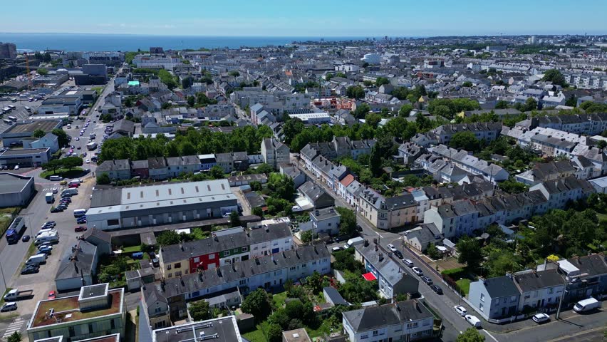 Forward aerial movement and sightseeing above the settlement of Saint-Nazaire, France.