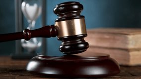 Super slow motion of gavel being struck to decide an auction or guilty verdict in court . Filmed on high speed cinematic camera at 1000 fps - Powered by Shutterstock - Get 15% off with code: PIKWIZARD15