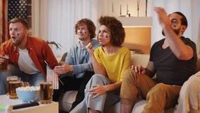 American sport fans watching soccer match on tv and drinking beer, cheering for USA team. European and World championship, USA, Canada, Mexico. Sports and soccer fans. Slow Motion - Powered by Shutterstock - Get 15% off with code: PIKWIZARD15