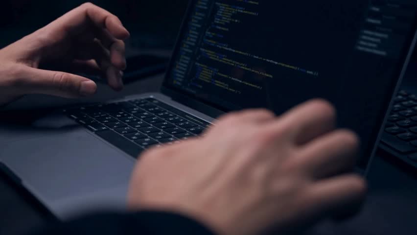 man hands coding html and programming on screen Blockchain crypto developer and binary program code concept hands coding and programming on laptop.