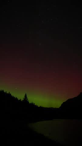 Chasing the Perseids meteor shower under the Northern Lights, Two Jack Lake, Banff National Park, Alberta, Canada 