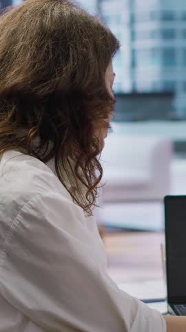 Vertical Video Human resources staff evaluating job applicant and examining their resumes during selection process, corporate job offer. Recruiters selecting candidates based on work experience