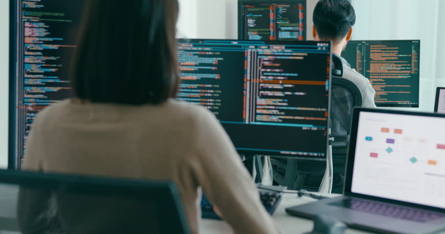 Closeup Adult Asia male, female freelance typing write prompt AI bot IT app smart program nomad, video game, terminal with coding language, user interface, designer, big data center desktop computer.