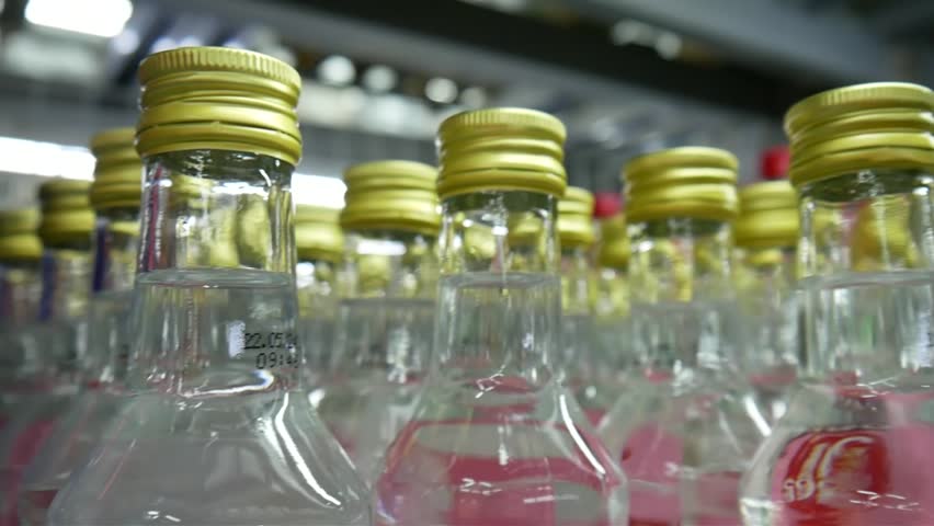 Close-up of many vodka bottles in a grocery store