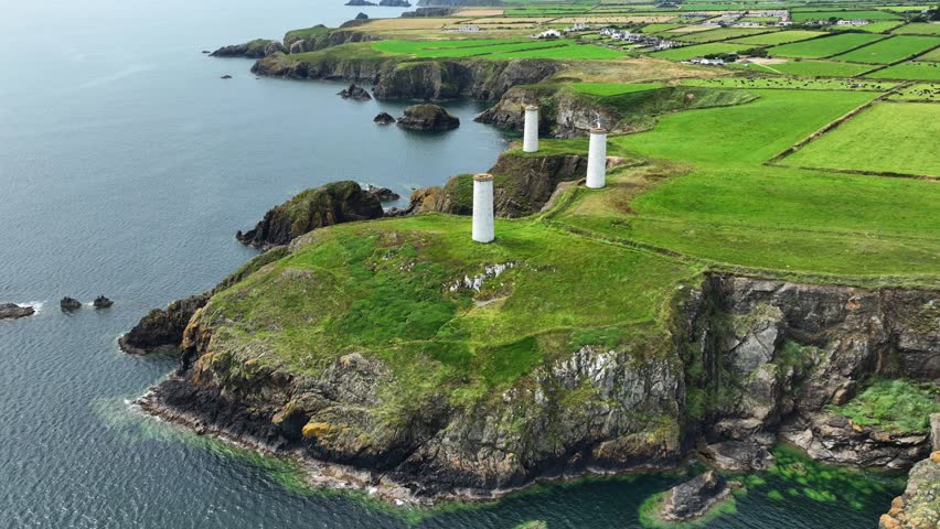 Ireland Epic Locations aerial landscape Waterford Coast the three towers at Tramore bay warning ships of the dangers of these waters