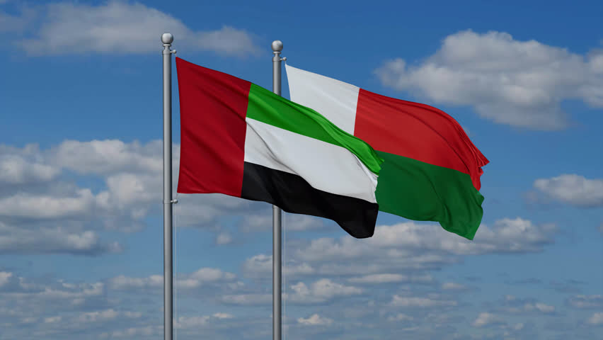 Madagascar and United Arab Emirates flags flying together, video concept of the relationship, two country relations concept