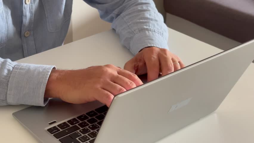 Close up casual businessman typing on laptop keyboard, preparing electronic report, web surfing information, doing marketing data research or communicating with client online, sitting at desk - Powered by Shutterstock - Get 15% off with code: PIKWIZARD15