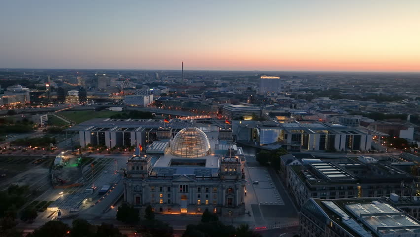 Aerial view of famous places landmarks Reichstag, TV Tower at sunrise. City of Berlin, Germany architectural from above.