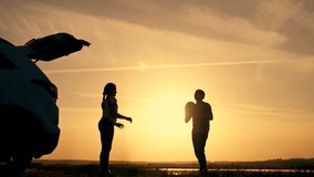 Happy family concept. father's day Dad and child made car stop. sunset in nature. dad and baby throw a ball against the background of a car. father's day with child in nature. family game on vacation - Powered by Shutterstock - Get 15% off with code: PIKWIZARD15