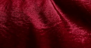 Closeup texture of red velvet fabric in waves. Rich burgundy velor fabric background - Powered by Shutterstock - Get 15% off with code: PIKWIZARD15