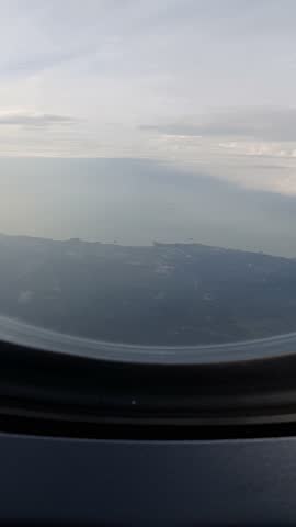 Malaysia - march 05, 2022 - flight in the sky of malaysia and view of around kuala lumpur city from above during flight