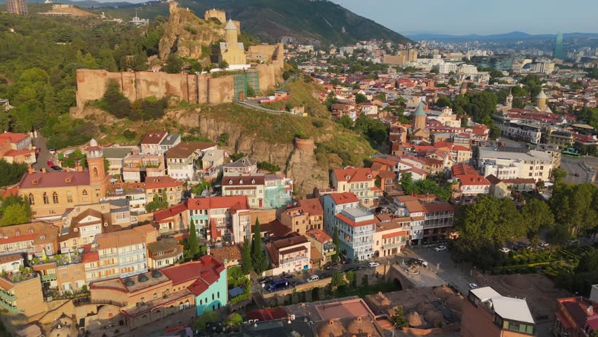 Tbilisi old town aerial view, Georgia. Fly over ancient district Abanotubani in Tbilisi, also known as Sulfuric Baths. Georgian Capital Skyline