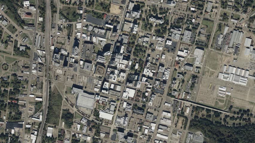 Earth zoom in from space to Jackson, Mississippi, USA. Followed by zoom out through clouds and atmosphere into space. Satellite view. Travel intro