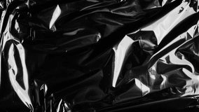 Black Crumple Glossy Texture Grunge Looping Animation Background  - Powered by Shutterstock - Get 15% off with code: PIKWIZARD15