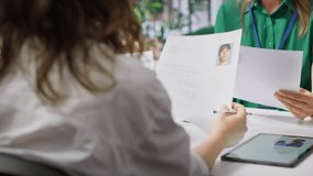 Human resources staff evaluating candidates resume in the selection process, reviewing all applicants after job interview in order to hire the right person. Recruiters seeking personnel. Camera A. - Powered by Shutterstock - Get 15% off with code: PIKWIZARD15
