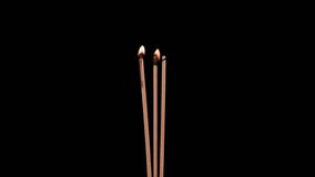 Photography for dynamic scenes, ignite, a candle flame igniting three wooden sticks from above as wax drips down. - Powered by Shutterstock - Get 15% off with code: PIKWIZARD15