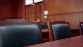A wooden room with black chairs and a wooden table - Powered by Shutterstock - Get 15% off with code: PIKWIZARD15