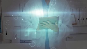 Using tablet, medical professional processing futuristic data in laboratory background. Technology, healthcare, innovation, research, digital, analysis - Powered by Shutterstock - Get 15% off with code: PIKWIZARD15