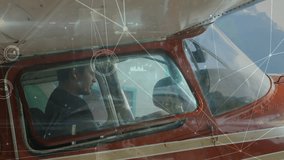 Pilot in cockpit flying small aircraft with data processing animation overlaid. Aviation, technology, flight - Powered by Shutterstock - Get 15% off with code: PIKWIZARD15