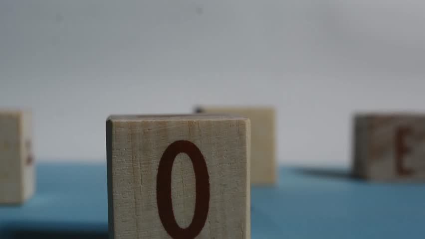 LOVE word written on wood block. Content text on wooden table for your desing, concept.