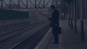 Financial graph animation over businessperson talking on phone at train station. finance, technology, communication, travel, investment, smartphone - Powered by Shutterstock - Get 15% off with code: PIKWIZARD15