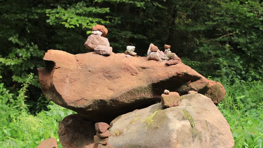 brown stones stacked in a figure, german forest