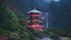 Nachi waterfall with red pagoda, Nachi, Wakayama, Japan - Powered by Shutterstock - Get 15% off with code: PIKWIZARD15