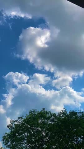 A swift, drifting cloud racing across the sky, chased by the winds of change.