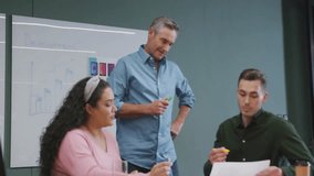 Data analysis and facial recognition animation over diverse team in office meeting. Teamwork, technology, collaboration - Powered by Shutterstock - Get 15% off with code: PIKWIZARD15