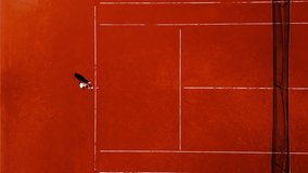 Top view of woman playing recreational tennis on a clay court during the day. - Powered by Shutterstock - Get 15% off with code: PIKWIZARD15