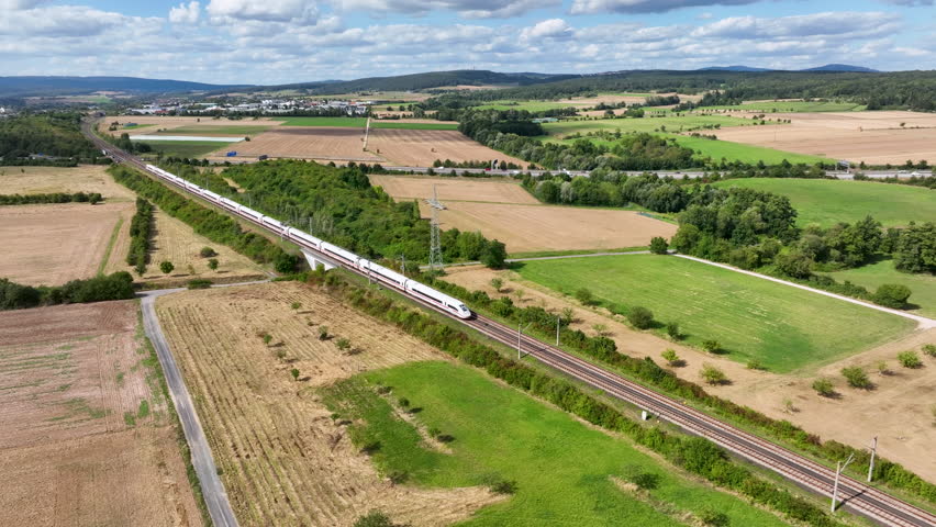 A passing highspeed train - aerial view