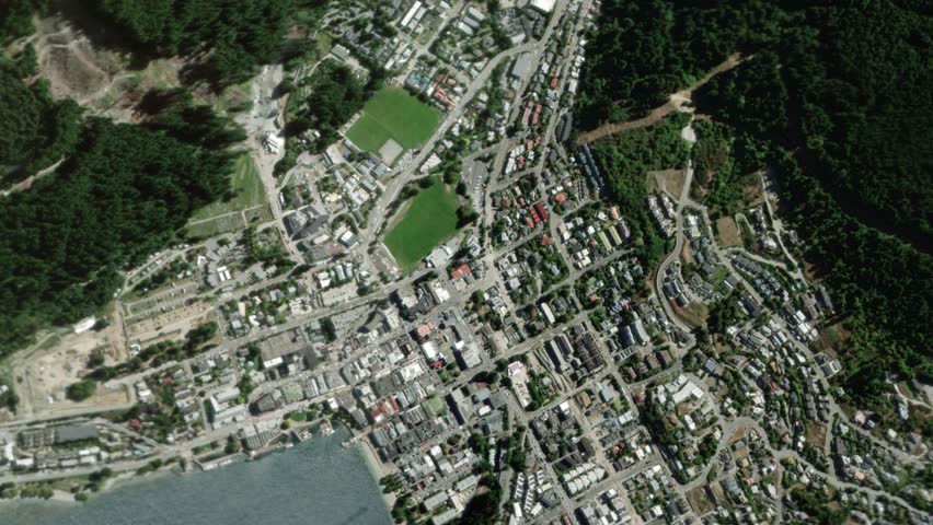 Zooming in on Queenstown, New Zealand frome space - Perfect for Travel Intros and Backgrounds. Realistic 3D Animation.