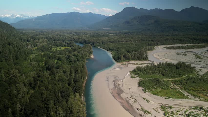 Aerial above confluence of Skagit River and Sauk River in Rockport Washington in summer