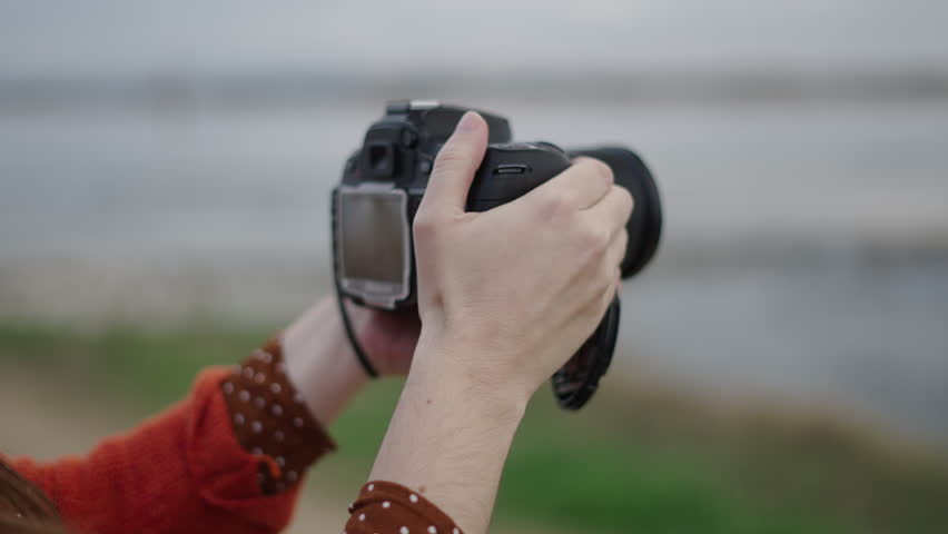 A woman hands take a picture