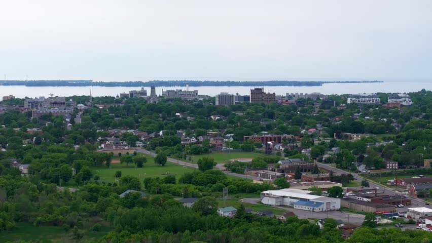 Aerial views looking towards downtown Kingston Ontario and St. Lawrence River in summer