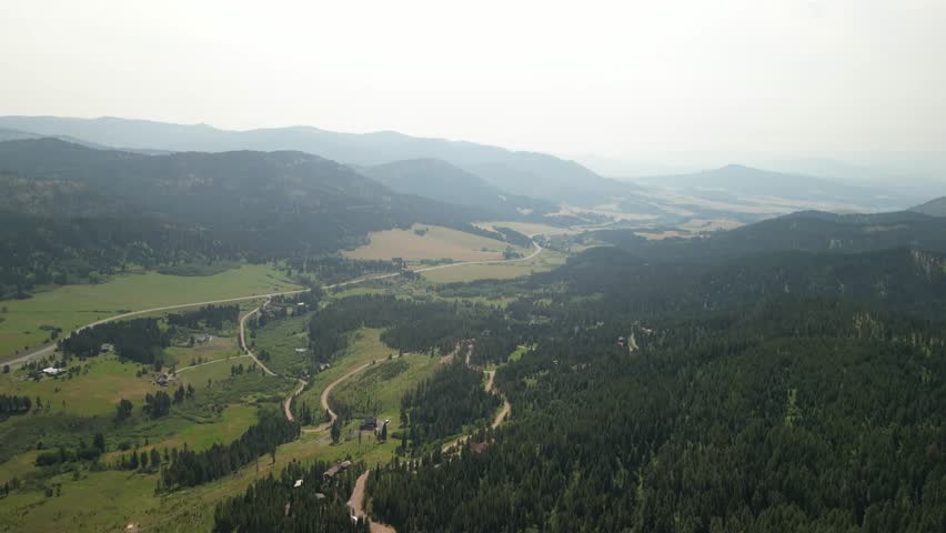 Aerial of mountain homes in summer in Bridger Mountains in Montana