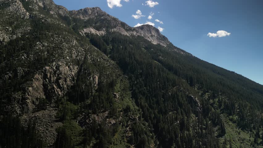Aerial of rocky cliffs in Okanogan Mountains near North Cascades in Washington in summer