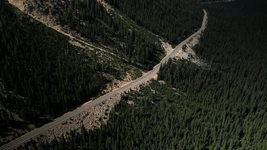High angle aerial on Highway 20 through North Cascade Mountains in Washington in summer
