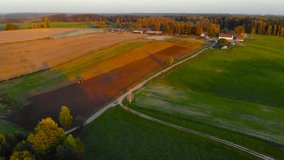 Epic Aerial View of Countryside Landscape. Morning Sunrise. Farm, Rural Scenery Farmland Autumn Forest. Farming Agricultural Seasonal Works. Aerial Drone View Autumn Colorful Trees. Evening Sunset Sun - Powered by Shutterstock - Get 15% off with code: PIKWIZARD15