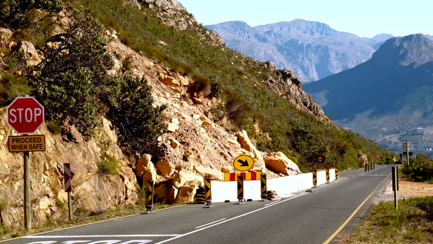 Rockfall barricaded for safety on Franschhoek Pass, stop and go section