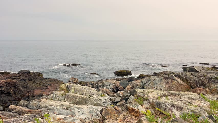 seascape view ocean beach and rock cliff in Ogunquit, Maine United States