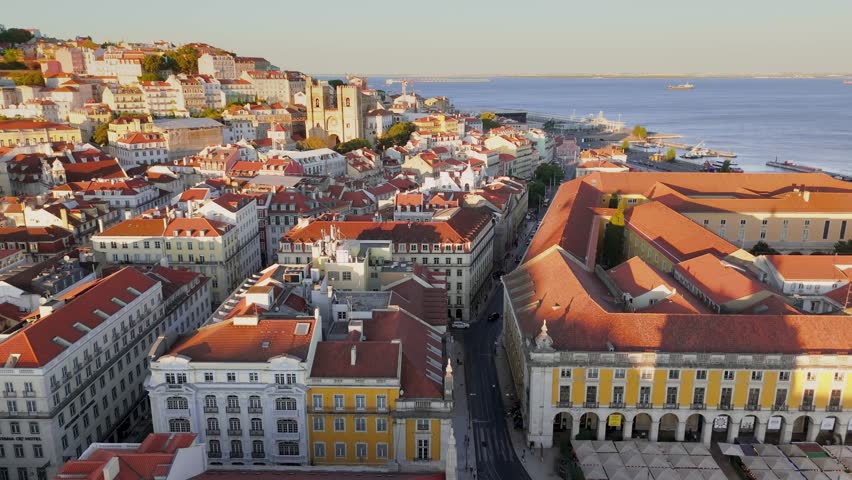 Aerial view of Lisbon downtown at sunset. Vertical drone footage