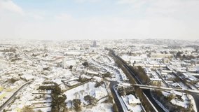 Bar chart animation over aerial view of snowy cityscape. Data, analytics, business, technology, urban, winter - Powered by Shutterstock - Get 15% off with code: PIKWIZARD15