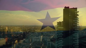 Ghana flag animation over cityscape with modern skyscrapers at sunset. skyline, buildings, urban, dusk, architecture, national - Powered by Shutterstock - Get 15% off with code: PIKWIZARD15