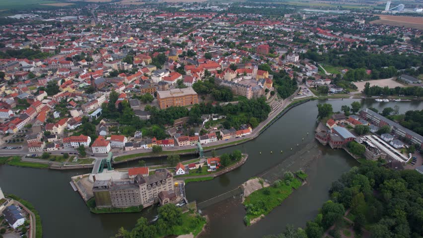 An Aerial panorama view around the old town of the city Bernburg on an early summer day in Germany.