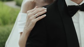 Elegant wedding video with bride and groom hugging, showing off ring - Powered by Shutterstock - Get 15% off with code: PIKWIZARD15