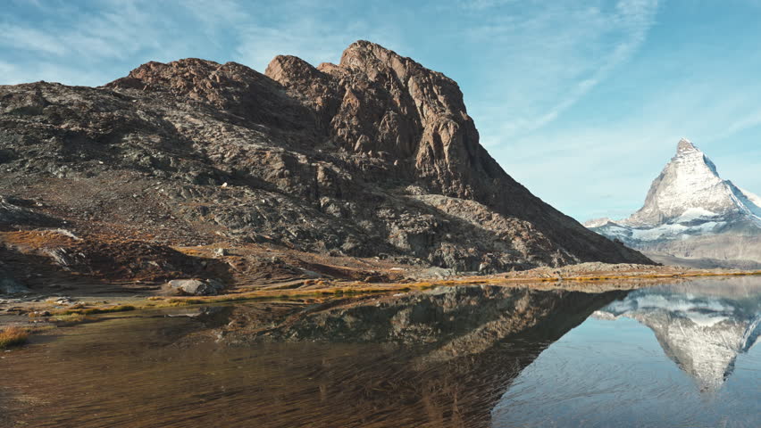 Beautiful landscape of Riffelsee lake and Matterhorn iconic mountain reflection in the morning at canton of Valais, Switzerland