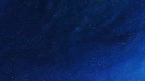 Abstract shiny background video with glitters in motion. Footage with flickering liquid particles. Creating an abstract backdrop with liquid overflowing inks and sparkling shimmers. - Powered by Shutterstock - Get 15% off with code: PIKWIZARD15