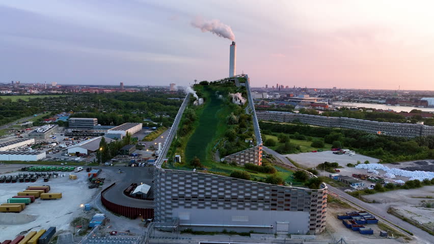 Aerial view of famous places heat and power waste to energy plant and sport park in Copenhagen at sunset, Denmark.